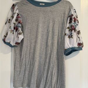 Elegant Gray Top with Floral Sleeves